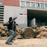 Toulouse, Haute-garonne, Occitania, France, 2024-01-16. Two farmers throwing apples; the facade of the administrative building housing the government's departments is cluttered with agricultural waste. Converging from the surrounding departements, nearly 400 tractors and 1,000 farmers demonstrated in the streets of the regional capital, in response to a call from the FNSEA and Jeunes Agriculteurs unions. They were protesting against ever-increasing taxes and standards, and ever-decreasing remuneration. Photo by Patrick Batard / Hans Lucas.
Toulouse, Haute-garonne, Occitanie, France, 2024-01-16. Deux agriculteurs en train de jeter des pommes; la facade de la cite administrative, regroupant les services de l etat, encombree par des dechets agricoles. Convergeant depuis les departements alentour, pres de 400 tracteurs et 1000 agriculteurs on manifeste dans les rues de la capitale regionale, a l appel des syndicats FNSEA et Jeunes Agriculteurs. Ils denonceant des taxes et normes toujours plus nombreuses, et une remuneration toujours en baisse. Photo de Patrick Batard / Hans Lucas.